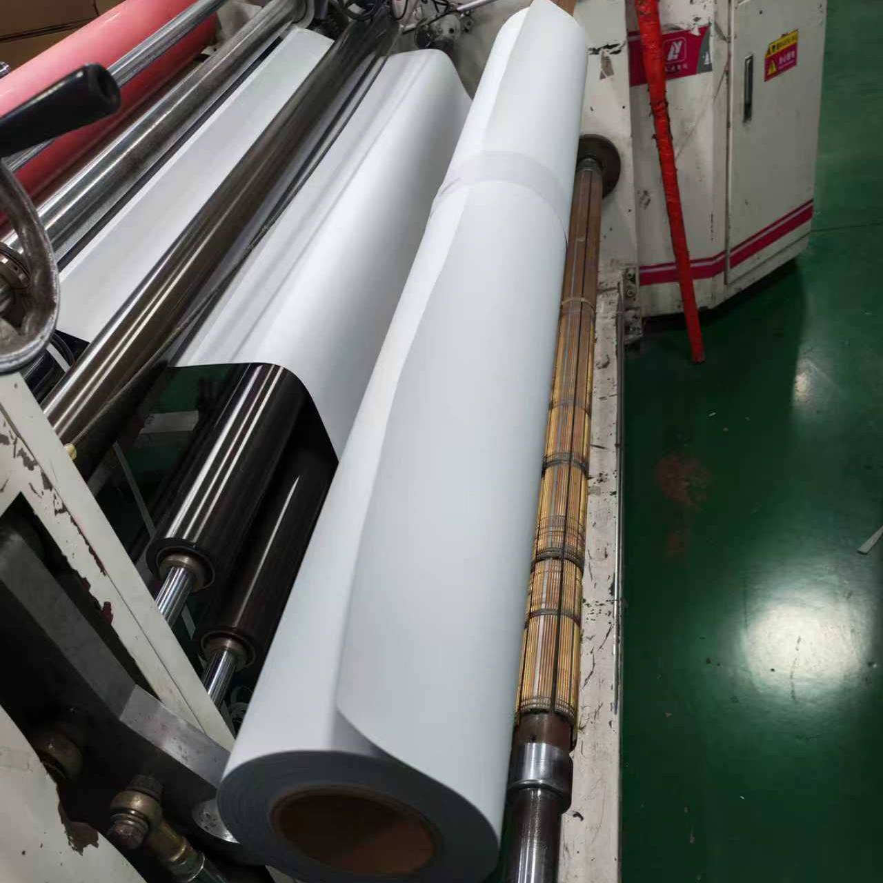Finished white-face ferrous PET film rolls