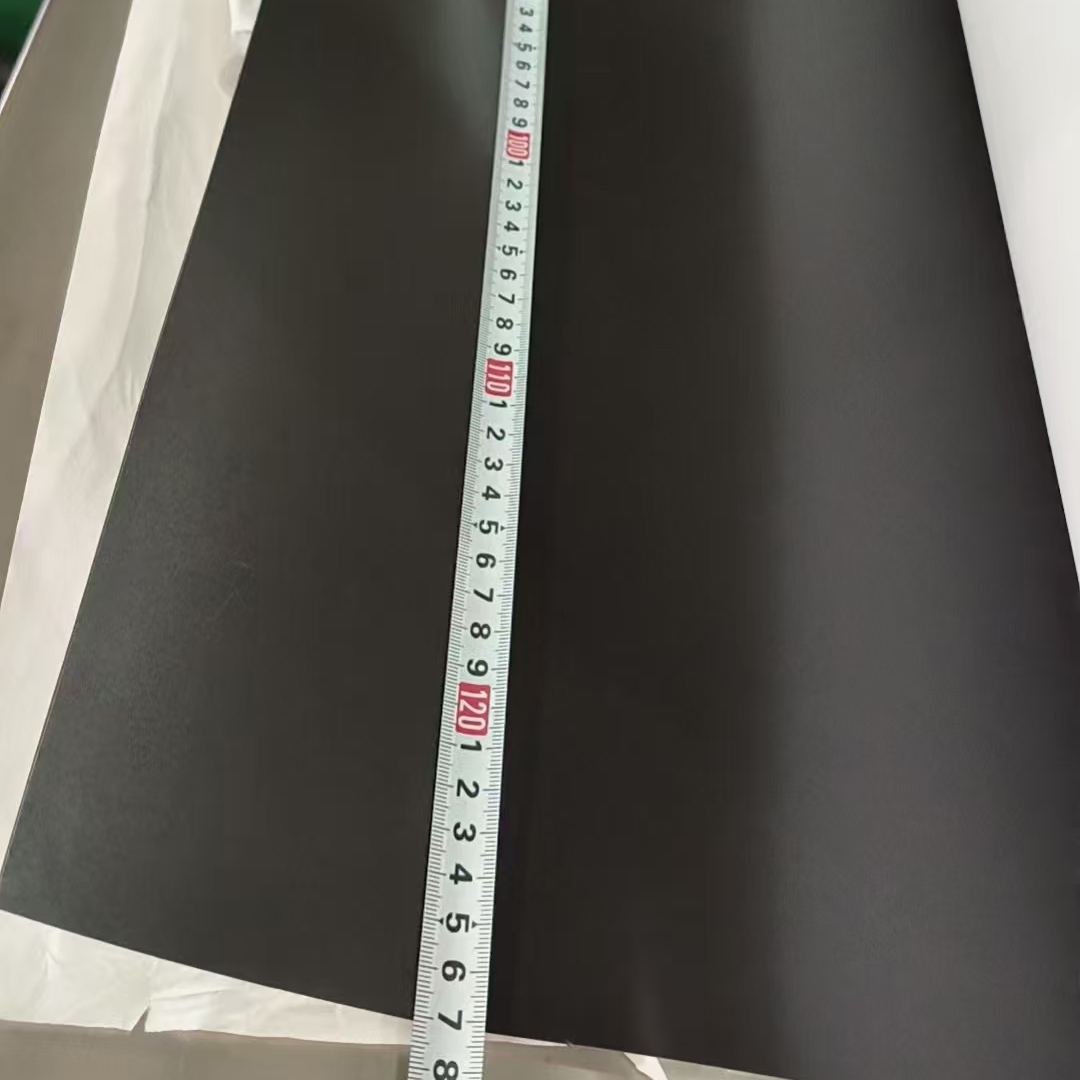 Ferrous PET film sheet measured to length