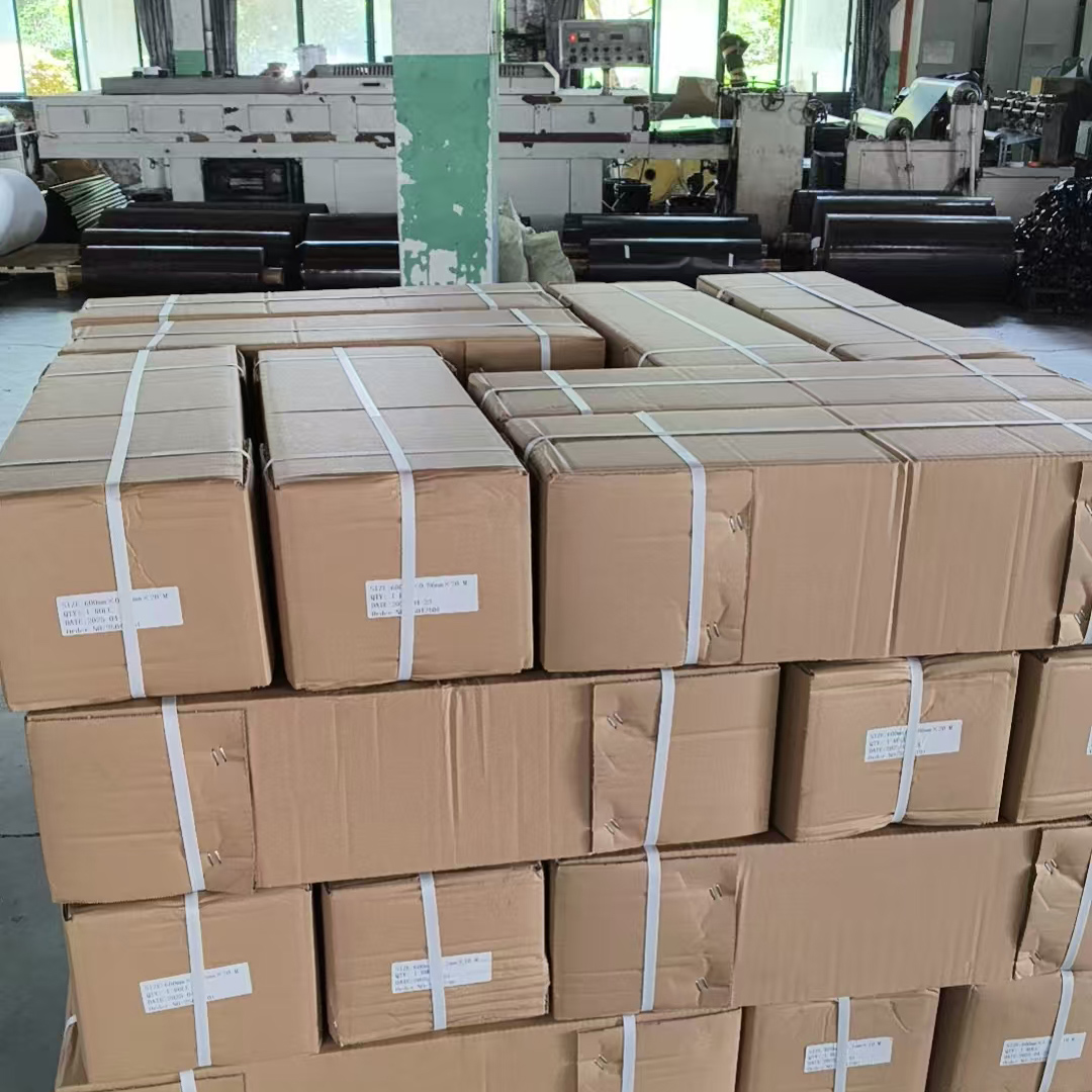 Rubber magnet strip wound onto a reel on the production line